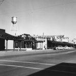 25 - West side Gilbert Rd with water tower and old west decor 60s